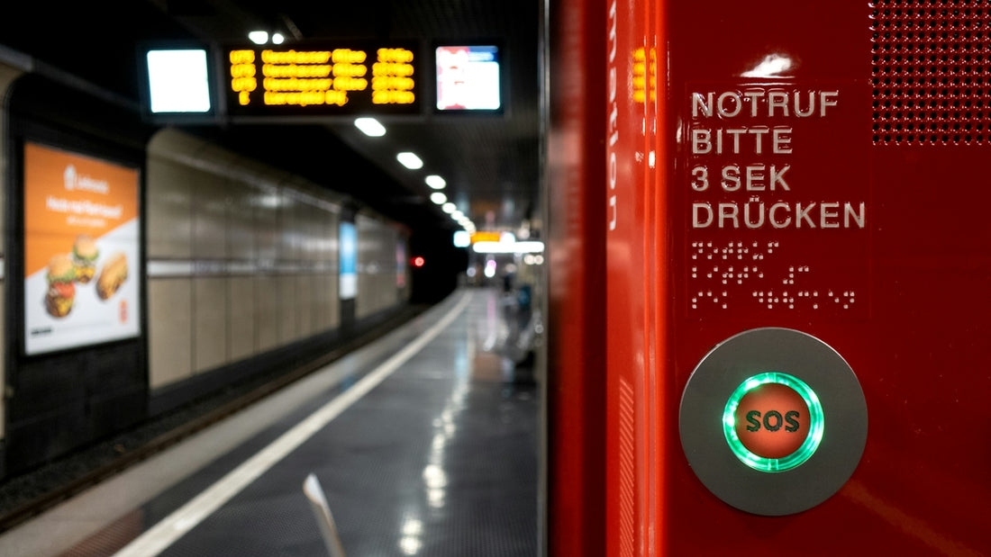 a train station with a sign