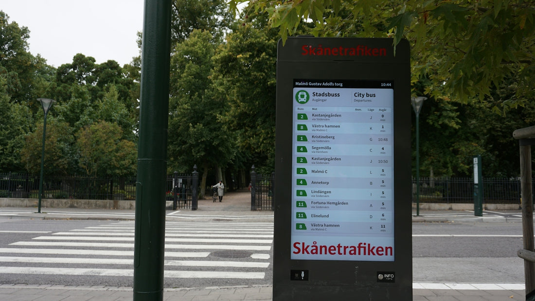 A digital bus departure display at Gustav Adolfs torg in Malmö, Sweden